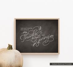 a chalkboard with the words thank you and giving written on it next to a pumpkin