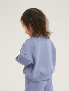 Kids everywhere are loving it. Super soft and ultra-functional, our Cubby Sweater for Kids has a unique fuzzy fleece lining, even in the sleeves and pockets.    Made with premium fabric you won't find anywhere else. Lined with a special fuzzy texture that is softer and more luxurious than regular fleece.  Washed and tested 40x for pilling, shrinkage, and color fade. Hidden functional pockets lined with super soft fuzz. Developed, improved, and tested for comfort for over 2 years. Guaranteed all-day comfort with the right size. Casual, loose, and ultra-cozy fit, perfect for kids.  Materials: 64% Cotton 32% Polyester 4% Spandex Comfortable Spring Outerwear With Pockets, Spring Outerwear With Pockets, Snug Solid Sweater For Loungewear, Snug Sweater With Ribbed Cuffs For Loungewear, Comfortable Loungewear Outerwear With Ribbed Cuffs, Cozy Spring Sweatshirt With Pockets, Comfy Cotton Outerwear With Relaxed Fit, Snug Long Sleeve Outerwear For Layering, Comfy Solid Outerwear For Fall