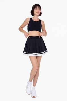 Crafted with perfect pleats, this tennis skirt features a contrast stripe trim in a high end grosgrain ribbon and built in undershorts with pockets for coverage and convivence.Kelsey is 5'9", a size 2, and is wearing an S100% recycled polyester Sporty Stretch Pleated Mini Skirt, Sporty Stretch Pleated Skirt For Summer, Pleated School Tennis Skirt, Fitted Pleated Skirt For Sports, Sporty Fitted Skort With Pleated Skirt, Sporty Fitted Pleated Skort, Pleated Skirted Skort For Sports, Sporty Pleated Skirted Shorts, Summer Sporty Pleated Lined Skirt