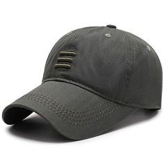 a grey baseball cap with metal pins on the front and side, sitting against a white background