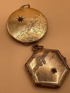 These two gold plated Victorian lockets pendants are in pretty good condition. They open and close easily and they aren't in such bad shape. One has a tiny dent on the back and one of them is a little loose. when has the lucky horseshoe and one is round in much better shape looks more golden. Antique Charms Locket Necklace For Wedding, Gold Locket Necklace With Vintage Charm, Gold Pendant Locket Necklace With Vintage Charm, Medallion Locket Necklace With Charms For Wedding, Wedding Medallion Locket Necklace With Charms, Heirloom Pendant Locket Necklace With Charms, Victorian Filigree Medallion Locket Necklace, Victorian Medallion Locket Necklace With Filigree, Victorian Style Filigree Medallion Locket Necklace