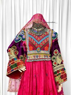 Beautiful afghan dress - traditional bridal afghan dress - Vintage Kuchi tribal Morden Dress - Afghan Dress For Women - Rare find as this is a vintage deess Measurements : UK SIZE 8 - 14 (SIZE MEDIUM ZIP) AND BELT TO ADJUST  Shoulder: 16inch Waist: 20 inch  Body: 15inch Arm length: 23 Material : printed pink Afghan Vintage meterial , and silk material is used for the shalwar, highest quality. - Expect imperfections as this is a vintage item, it has been made with care Hand stitched and perfectly Bohemian Long Sleeve Dress With Motifs, Bohemian Wedding Dress With Motifs, Bohemian Style Ceremonial Dupatta With Dabka, Bohemian Dabka Work Dupatta For Ceremonial Use, Bohemian Ceremonial Dupatta With Dabka Work, Bohemian Dupatta With Dabka Work For Ceremonial Use, Fitted Bohemian Dabka Choli, Fitted Bohemian Traditional Wear, Bohemian Ceremonial Dresses With Motifs