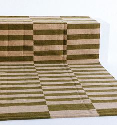 three pieces of brown and white striped material