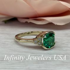 "The ring pictured is lab created emerald and moissanite #6902 Rose Gold is available upon request as a custom order and is a final sale (non refunable, non returnable, non exchangeable). Emerald is the Birthstone for May -Approximate total carat weight: 2.52ctw. diamond equivalent -Center Stone Size: approx. 2.40ct. diamond equivalent -Gem Type: Lab created emerald -Center Stone Shape: cushion cut 8x8mm -Center Stone Color: green, nicest color in emeralds -Center Stone Clarity: VS2 or better -M Oval Emerald Diamond Ring With Bezel Setting, Gia Certified Emerald Ring For Anniversary, May Birthstone, Classic Moissanite Emerald Ring For May Birthstone, Moissanite Emerald Ring For Anniversary, May Birthstone, Gia Certified Emerald Anniversary Ring May Birthstone, Emerald Moissanite Ring For Anniversary, May Birthstone, Moissanite Emerald Ring For Anniversary, Heirloom Green Diamond Ring With Bezel Setting, Emerald Ring With Bezel Setting For Anniversary, May Birthstone