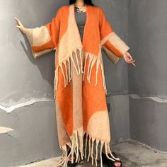 This super soft and warm wool cardigan kimono is perfect for the cold weather. Unlike other sweaters and wools, the wool used for this beauty is non itchy. Think of your favorite throw blanket, the comfort and warmth it gives but 10x stylish and wearable any where. This kimono is all that and more! One size fits S-4X Material: Wool One Size Fits Most Size Chart Oversized Long Sweater Coat For Winter, Cozy Acrylic Outerwear For Cold Weather, Knitted Acrylic Sweater Coat For Fall, Fall Knitted Acrylic Sweater Coat, Fall Acrylic Knitted Sweater Coat, Cozy Long Outerwear For Layering, Long Winter Sweater For Cold Weather, Cozy Long Winter Outerwear, Warm Long Sleeve Acrylic Outerwear