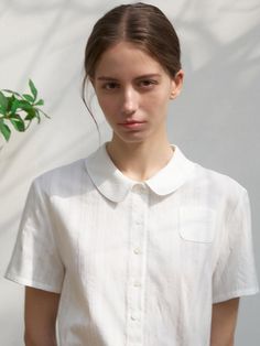 This is a comfortable and unique blouse by BLBT that is made out of high quality and sturdy fabric. With trendy design detail and minimal feminine mood, you can style it for your daily casual outfit.- MARUWA  cotton 100% fabric- Peter pan collar with retro mood- Small pocket detail on the front- Pleats on the back yolk White Collared Neckline Tops For Everyday, White Linen Top With Collared Neckline, White Relaxed Fit Blouse With Collared Neckline, White Collared Tops For Everyday, White Blouse With Relaxed Fit And Collared Neckline, White Blouse With Collared Neckline And Relaxed Fit, White Collared Everyday Shirt, White Collared Shirt For Everyday, Everyday White Collared Shirt