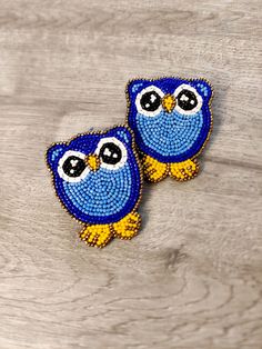 Cute Owl seed beads earrings are totally handmade. It has the charm that holds the attention of the crowd. Totally girlish and so new that you have not seen this unique design anywhere else. The vibrant colors and the making of the earring will surely have the quality to stand out in the crowd. They are So light weighted and easy to carry. I can say only one word for these earrings AWWWWWWWWWWWW. :) Playful Blue Jewelry For Jewelry Making, Playful Handmade Adjustable Earrings, Fun Handmade Blue Jewelry, Handmade Blue Novelty Earrings, Blue Handmade Novelty Earrings, Cute Colorful Beaded Blue Jewelry, Cute Blue Jewelry With Colorful Beads, Handmade Whimsical Beaded Drop Earrings, Playful Handmade Drop Earrings