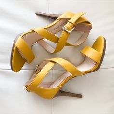 Luxury Women’s Designer Shoes “Tahari” Luxe Mustard Heel Sandal “Tahari” Luxe Mustard/Muted-Yellow Heel Sandals! Versatile Day To Night Wear! Pairs Well With Most Styles! Wears Well For Most Occasions! Easy Elevation To Any Style! Next Level Footwear! Simple Sophistication! Luxe Designer Heel Sandal Simple Sexy Multi Strapped Instantly Elevates Any Style Side Bucket Closure Versatile Day To Night Wear 4” Heel Height Pairs Well W/Most Styles Next Level Status Footwear Excellent New Condition Smoke Free Pet Free Environment Thanks For Browsing My Boutique!! Yellow Heeled Sandals, Mustard Shoes, Muted Yellow, Yellow Heels, Silver Sandals, Shoes Heels Wedges, Strappy Sandals Heels, Night Wear, Leather Wedge Sandals