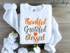 Thankful Grateful Blessed Sweatshirt, Thanksgiving Sweatshirt, Fall Sweat, Autumn Sweater, Thankful Sweatshirt, Pumpkin season, gift for her - How To Order ----- 1-) Please, check and review all the photos. 2-) Choose your t-shirt size and color. *We use more than one brand product. Different styles of shirts may have different shades of same color choice due to different manufacturer brands. *For this reason, we recommend you to match shirts from the same styles if you want precisely matching colors (ex. Unisex, V-necks, Toddler, etc.). 3-) Click add to cart. You can go back to add more shirts. 4-)Click "Proceed to check out". 5-)When you check out, you can add a note to seller for any request. ----- Unisex Shirts ----- * Unisex t shirt fits like a well-loved favorite, featuring a crew ne Thanksgiving Sweatshirt Ideas, Thankful Sweatshirt, Grateful Shirt, Paterson Nj, Thanksgiving Sweater, Thanksgiving Sweatshirt, Autumn Sweater, Thankful Grateful Blessed, Diy Thanksgiving