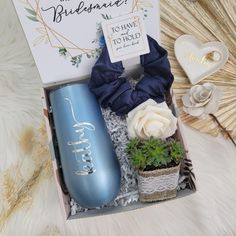 a box with some flowers and other items in it