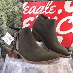 American Eagle By Payless Hana - Women’s 5.5m, Olive Green Faux Suede Uppers, Stitching Detail, Pointed Toe Ankle Booties, Side Zippers For Easy On/Off, 2” Woodgrain Block Heels, Boots Stand 5” Tall, Memory Foam Insoles, Tan Textured Rubber Soles. Brand New With Tag & In Box Synthetic Ankle-high Booties For Fall, Fall Synthetic Ankle-high Booties, Synthetic Spring Boots With Low Heel, Casual Synthetic Boots With Pointed Toe, Fall Booties With Stacked Heel In Synthetic, Fall Synthetic Booties With Stacked Heel, Fall Synthetic Boots With Cushioned Footbed, Casual Heels With Heel Tab For Fall, Fall Season Synthetic Boots With Cushioned Footbed