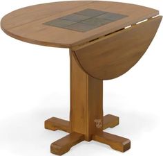 a wooden table with a tile top and two cross legs on each side, in front of a white background