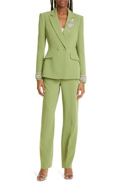 Sparkling rhinestones at the cuffs and lapels glamorize the traditionally polished silhouette of a double-breasted blazer rendered in a pastel-green hue. 28" length (size 8) Peaked lapels Lined 69% triacetate, 31% polyester Dry clean Imported Chic Evening Suit Embellished, Chic Embellished Evening Suit, Long Sleeve Blazer With Rhinestones For Work, Elegant Fitted Blazer With Rhinestones, Elegant Evening Blazer With Rhinestones, Festive Elegant Blazer For Workwear, Formal Fitted Blazer With Rhinestones, Chic Embellished Suits For Formal Occasions, Chic Rhinestone Blazer For Work