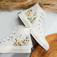 '' Custom Embroidered Wedding Shoes, White Flower Embroidered Sneakers, Daisy Embroidered Converse, White Flower Garden Embroidery Sneakers, Wedding Converse, Wedding Gifts'' 🍀 Price includes Converse Shoes and Floral Embroidery Designs as shown 🍀 🍀 Shoe Type: Converse 1970s 🍀 Shoe color: 2. Invory_1970s 1. DETAILS 🍀 You can send me your Converse, Vans, canvas shoes or I can buy them for you. Custom-ordered embroidered Vans and Converse shoes, please wait another 2-4 days. Each pair is hand Spring Sneakers With Embroidered Round Toe, Spring Embroidered Sneakers With Round Toe, Spring Embroidered Round Toe Sneakers, Spring Floral Embroidered Round Toe Sneakers, Wedding Low-top Sneakers With Floral Embroidery, Spring Wedding Embroidered Sneakers, White Wedding Sneakers For Summer, Spring Sneakers With Floral Embroidery, White Embroidered Sneakers For Spring