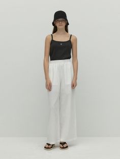 This is a trendy and feminine pants by DEPOUND that is made out of high quality and sturdy material. With distinctive mood of the design and comfortable wear, you can style it for your casual daily outfit.- Linen like ribbed fabric- Metal charm detail below the pocket- Elastic waistband with string White Wide Leg Viscose Pants, White Viscose Wide Leg Pants, White Viscose Pants For Spring, Casual High-waisted Viscose Pants, Modern Trousers For Loungewear, Casual Viscose High-waisted Pants, Modern White Ankle-length Wide Leg Pants, Casual Viscose Pants For Daywear, Feminine Pants