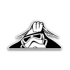 a sticker with the image of a storm trooper holding up his fist and wearing a helmet