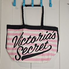 Brand New With Tag Victoria's Secret Pink And White Striped Canvas Tote Bag. Black Trimmed And Black Twisted Rope Handles. Snap Button Closure. Has Inside Pocket. 2018. Body Of Bag Is 100% Cotton And Inside Is 100% Polyester. *Does Have Some Yellow Spots From Being Stored. See Pics. Approx 23.5" Across And 14.5" Tall. Bottom Opens To Almost 11" Across. Victoria's Secret White Bag For Beach, Victoria's Secret White Beach Bag, Victoria's Secret Pink Bags For Vacation, Victoria's Secret Pink Vacation Bag, Trendy White Victoria's Secret Shoulder Bag, Plaid Tote Bag, Suede Tote Bag, Plaid Tote, Suede Tote