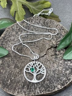 I will fabricate this Tree of Life inspired sterling silver necklace with a 6mm gemstone of your choosing in the drop down menu. A statement necklace made in sterling silver with the branches representing growth, greater knowledge and new experience in life. The diameter of the pendant portion is approximately 1.25 inches and I offer a 16 or 18 inch sterling silver box chain with a lobster clasp. I offer various gemstone selections and chain lengths in the drop down menu! Please let me know whic Spiritual Sterling Silver Charm Necklace With Gemstone, Nickel-free Sterling Silver Oval Pendant Necklace, Silver Necklace For May Birthstone Anniversary, Silver Necklace For Anniversary With May Birthstone, Green Sterling Silver Charm Necklace, Sterling Silver Necklace For May Birthstone Jewelry Making, Sterling Silver Teardrop Pendant Birthstone Necklace, Sterling Silver Pendant Necklace With May Birthstone, Sterling Silver May Birthstone Necklace