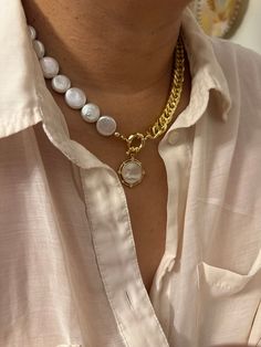 Looking for statement jewelry that is as strong and beautiful as you? Look no further than Pretty in Pearls. This necklace features coin fresh water pearls, a chunky chain, and a mother of pearl charm. A perfect combination of elegance and edge.  - 14kt gold plating over brass featuring fresh water coin pearls  - the necklace itself is 16" and comes with a 4" extender  - due to the natural nature of coin pearls will can vary in shape,  texture and color tone  handmade by me! Coin Pearl Bracelet, Half Pearl Half Chain Necklace, Half Chain Necklace, Coin Pearl Necklace, Mixed Metal Necklace, Gold Link Necklace, Natural Nature, Coin Pearls, Metal Necklace