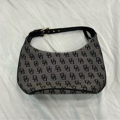 Nwot D&B Handbag Feel Free To Ask Any Questions $0-$49 Items Bogo Free & $50+ Items Bogo 50% Open To Trades Smoke-Free Home Purchases Made By 8pm Est Sunday-Friday Will Be Shipped Out Next Day! Thanks For Stopping By! Happy Poshing! Casual Shoulder Bag With Logo Hardware For Everyday Use, Casual Bags With Logo Hardware For Daily Use, Casual Bags For Daily Use With Logo Hardware, Gray Shoulder Bag With Gold-tone Hardware For Everyday, Gray Bag With Branded Hardware For Daily Use, D B, Dooney Bourke Handbags, Dooney Bourke, Mini Bag