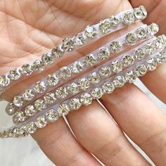 This clear and sparkling rhinestone trim, looks more beautiful in person! you can trim short ,it is better cut with the line of rhinestone,which is nice pieces on any craft projects Fine workmanship ,beautiful and in delicacy, the crystal patch can arranged by your own . the beautiful applique can be made in nice neckline collar ,bridal gloves, wedding garters, bridal veil,costumes belt,crafting any sort of stuff. appliques for clothes, dress, hat, garment clothing. Feature: Rhinestone Colour:Si White Sparkling Crystal Rhinestone Necklace, Glamorous White Sparkling Rhinestone Necklace, White Diamond Rhinestone Necklace For Party, Dazzling Rhinestone Necklace For Wedding, Glamorous Embellished Rhinestone Necklace For Wedding, Dazzling White Rhinestone Necklace, Wedding Rhinestone Necklace In Diamond White, Wedding Garters, Bridal Gloves