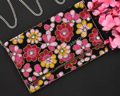 This luxury handbag made with high quality beads, gems and cotton with classy strawberry design. And you are going to get many compliments from that people who knows the taste of luxury and handmade products 🌷 This bag is eye-catching with its handmade beads and goes well with traditional and modern outfits. You can use the purse/bag with or without the sling or chain. A heavy amount of natural beads is embroidered into the bag.  🌷 The luxury fashionable evening classy bags feature clutches an Multicolor Handwork Evening Bag For Party, Embellished Multicolor Evening Bag As Gift, Multicolor Embellished Evening Bag As Gift, Classy Bags, Beach 2024, Festival Purse, Strawberry Design, Embellished Bags, Wedding Purse