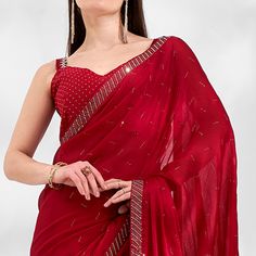 Red colored saree is made from chiffon fabric which is highlighted with beautiful beads & stones work and tassels border as shown. comes along unstitched satin blouse piece which you can customise as per your design/style. Occasion - You can wear this saree for parties, functions and ideal for any fashionista. Note:- The actual product may differ slightly in color and design from the one illustrated in the images when compared with computer or mobile screen. Measurements: Saree : Chiffon : 5.5 Mtrs Blouse : Chiffon : 0.8 Mtr Material: Chiffon Stitch Type: Unstitched Country of Origin: India Care Guide: Dry Clean Elegant Red Chiffon Saree, Red Embellished Georgette Pre-draped Saree, Red Embellished Pre-draped Georgette Saree, Embellished Chiffon Saree For Party, Red Chiffon Party Saree, Party Embellished Chiffon Saree, Red Georgette Sharara With Unstitched Blouse, Red Sharara With Unstitched Blouse, Embellished Saree For Celebration With Traditional Drape