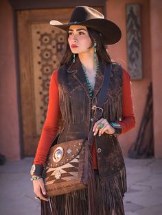 I love a great vest! This is a great finish to any western outfit. Our Whiskey Jessie Fringe vest was created with careful placement of fringe and pockets. Loaded with hand stitching, our Italian leather has and amazing attention to detail. Fun to wear, and a true Wild West Statement! Fine distressed Italian leather in camel's, taupe's and chocolate. We do stock inventory, but please allow 4 weeks, if we are in production, contact if you are in a rush. We can change arm length, but do not divert Western Style Vest With Pockets For Fall, Rodeo Decor, Affordable Trendy Clothes, Cowboy Carter, Nashville Outfit, Cowboy Pictures, Cowgirl Outfit, Nashville Outfits, Western Outfit