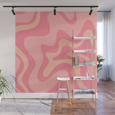 an abstract pink and white wall mural in a living room