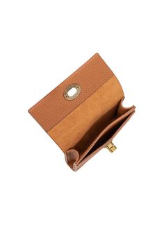 Crafted with a turn lock closure and made from vegan leather, the Rita card case is perfect for those looking for an elegant, sophisticated accessory. Designed with a pebbled finish and faux suede lining. Vegan Leather 4"W x 3.25"H x .75"D Turn-Lock Closure Brass-Tone Hardware Two Card Slots Faux Suede Lining Chic Brown Coin Purse With Card Slots, Classic Clutch With Fold Over Clasp For Daily Use, Chic Formal Coin Purse With Card Slots, Elegant Brown Coin Purse For Everyday, Chic Brown Card Holder, Classic Rectangular Coin Purse With Magnetic Closure, Elegant Rectangular Coin Purse With Fold Over Clasp, Chic Leather Card Holder With Card Slots, Chic Brown Card Holder With Card Slots