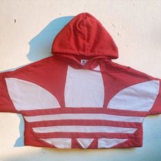 Brand New Without Tags High Quality Thick Material Vintage Style Red Orange Color Adidas Cropped Large Logo Hoodie. You've Never Been Afraid To Make A Statement. Neither Has The Trefoil. Stand Out In The Adidas Cropped Large Logo Hoodie. Just Throw It On And Head Out The Door. Loose Fit. Drawcord-Adjustable Hood. Cropped Hooded Sweatshirt. Drop Shoulder. Ribbed Cuffs. 100% Cotton French Terry. Machine Wash. Imported. Original Price $65 Without Tax Or Shipping Red Cotton Hip Hop Hoodie, Red Sportswear Tops For Spring, Red Spring Sportswear Tops, Spring Sportswear Tops In Red, Oversized Red Hip Hop Hoodie, Red Oversized Hip Hop Hoodie, Red Hip Hop Hoodie Top, Trendy Oversized Red Sweatshirt, Oversized Red Cotton Hoodie