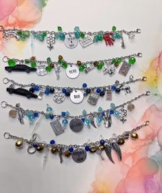 I did a a bunch of Characters for the SPN con I'm going to be selling at, so here they all are and they will be available in person in Chicago at that Con    The names of all the characters are in the bracelet middles, if you want a custom contact me.    Bracelet is 8 inches and can be customized, however. I can do other charms other characters or anything else you're looking for. I am working on some Dean and Sam bracelets and other characters too.    Thanks for looking. Novelty Dangle Charms Jewelry, Friendship Novelty Charm Bracelet, Metal Crystal Bracelet With Charms For Gift, Metal Crystal Bracelet With Charms As Gift, Personalized Metal Beaded Bracelets For Friendship, Multicolor Themed Personalized Jewelry, Adjustable Fantasy Bracelets As Gift, Adjustable Novelty Charms Bracelets, Customizable Metal Bracelet Jewelry