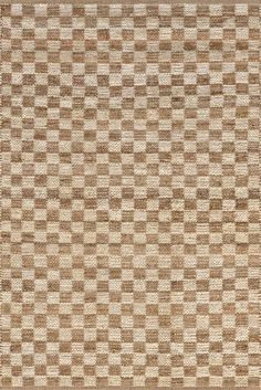 a brown and white checkered area rug