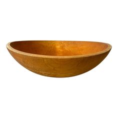 a wooden bowl is shown against a white background