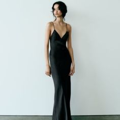 Satin Slip Dress Midi Dress With V-Neckline And Spaghetti Straps. Open Back. Black | 8325/840 Sleek V-neck Maxi Dress For Party, Vintage Slip Dress Aesthetic, Chic V-neck Slip Dress For Dinner, Elegant V-neck Dress With Spaghetti Straps For Party, Chic V-neck Evening Maxi Dress, Summer V-neck Evening Dress For Dinner, Sleek V-neck Maxi Dress For Summer, Elegant Backless V-neck Dress For Night Out, Spring Evening V-neck Slip Dress