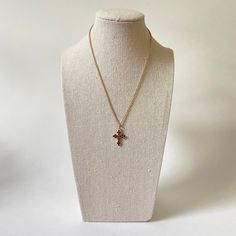 This little garnet cross is set in 900 silver with gold vermeil, with 18 natural garnet stones measuring approximately 2 mm each. The cross itself measures approximately 22.5 mm in length, and 17.5 mm in width, not including jump ring. The item listed here is old stock from a defunct jewelry business. Great condition unless otherwise noted. Please keep in mind that computer monitors vary & I do my best to provide an accurate representation of the colors of the items listed. Please note chain Yellow Gold Cross Charm Necklace With Adjustable Chain, Gold Plated Cross Pendant Necklace, Yellow Gold Brass Cross Pendant Necklace, Cross Pendant Charm Necklace With Adjustable Chain, Gold-plated Cross Necklace With Adjustable Chain, Yellow Gold Brass Necklace With Cross Pendant, Brass Cross Necklace As A Gift, Brass Cross Necklace For Gift, Gold Plated Cross Necklace With Adjustable Chain