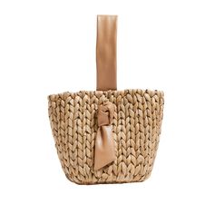 Timeless and posh, Pamela Munson’s straw accessories are beloved by island hoppers and city dwellers alike. Her bags reinterpret straw as a natural, sustainable material that can be worn any season, anywhere. The Petite Isla Bahia Basket Lady in Natural features handwoven cornhusk with a calfskin leather handle. Product Details Lined in cotton with one interior pocket. Top snap closure allows for two unique looks and functionality.Handwoven, natural cornhusk bucket bag with calfskin leather hand Chic Braided Straw Bag For Day Out, Chic Braided Bag For Day Out, Chic Braided Straw Bag For Beach Season, Chic Jute Bucket Bag For Spring, Chic Summer Braided Bucket Bag, Chic Braided Straw Bag For Vacation, Rectangular Braided Straw Bag For Day Out, Brown Woven Bucket Bag For Day Out, Braided Jute Bags For Day Out