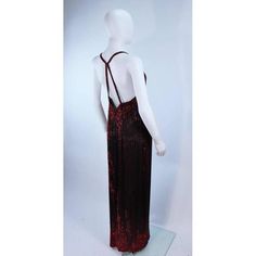 Description: Bob Mackie beaded black & red gown Embellished silk along with red hand beading Race-style halter Center back zip Dropped back Length: 60" Bust: 34-36" Waist: 28" Hip: 36-38" Worn by Brook Shields and featured on the cover of Cosmopolitan in 1983 Circa 1980's Details: Size: US 8Color: Black/RedMaterial: SilkCondition: Excellent Shipping: All orders are shipped with a standard flat rate of $9.95 or expedited flat rate of $19.95. Red Backless Evening Dress With Back Opening, Party Maxi Dress With Beaded Straps, Sequin Halter Neck Evening Gown, Red Floor-length Evening Dress With Back Opening, Red Halter Neck Evening Dress For Party, Red Halter Neck Maxi Dress For Gala, Backless Red Evening Gown, Red Sequined Maxi Dress For Evening, Red Backless Evening Dress