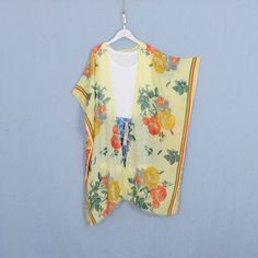 Welcome to my shop, I am in China. It will need around 30 days for international orders. Please consider the time when placing order. Long bohemian kimono,perfect for a casual day out or as a swimsuit cover up. Material: soft polyester fabric,comfortable One size fit all: Width: 35.5 inches (90cm) Side length: 42 inches (107cm) Back length:35.5 inches (90cm) CARE: Wash gently by hand in cold water. Single wash. Don't press! Hang to dry. Maybe you will like other items in my shop, find them here: V-neck Boho Print Kimono For Beach Cover-up, Printed Kimono Beach Cover-up For Beach Season, Long Printed Kimono For Beach Cover-up, Multicolor Summer Kimono For Beach Cover-up, Printed Wrap Kimono For Beach Cover-up, Summer Floral Print Wrap Cover-up, Hippie Printed Kimono For Beach Cover-up, Floral Print V-neck Kimono For Beach, Summer Hippie V-neck Kimono