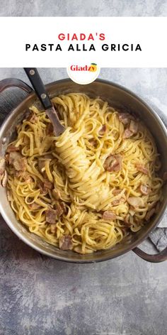 a pan filled with pasta on top of a table