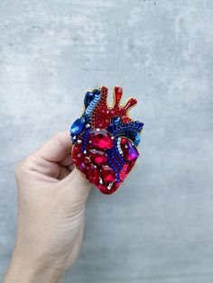 Check out this item in my Etsy shop https://www.etsy.com/listing/1267995954/embroidered-anatomical-heart-brooch Anatomical Heart Brooch, Heart Brooches Handmade, Novelty Brooch Jewelry Gift, Trendy Handmade Jewelry For Valentine's Day, Trendy Pins As A Gift, Trendy Pins For Gifts, Trendy Handmade Heart-shaped Jewelry, Trendy Brooch Jewelry For Gift, Unique Heart-shaped Jewelry Brooch