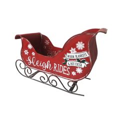 a red sleigh with white snowflakes on it and the words seugh rides written on its side