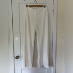 Calvin Klein Straight Fit Pant Beautiful Cream Color (How Cute For A Bridal Shower Or Dinner Rehearsal!?) Size 10 Double Lined So Not See Through Slits On The Sides Of Each Pant Leg Unfortunately No Pockets (Back Ones Are Fake) So Mad It Doesn’t Fit Me Anymore :( Washed But Never Worn (Was Hoping I Would Go Back To A Size 10) Zipper, Button And Clasp Front Gorgeous Pant Fitted Wide Leg Trousers With Side Slits, Elegant Fitted Wide Leg Pants With Side Slits, Chic White Bottoms With Side Slits, Elegant Calvin Klein Straight Leg Dress Pants, Calvin Klein Elegant Straight Leg Dress Pants, Elegant Calvin Klein Straight Dress Pants, Elegant Calvin Klein Trousers, Calvin Klein Fitted Wide Leg Bottoms, Calvin Klein Wide Leg Fitted Bottoms