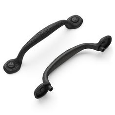 two black iron handles on a white background