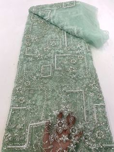 This high quality Fabric is measured in 5 Yards With Embroidered Beading and Sequin. It is soft, very delicate and beautiful. This high Quality Fabric is made with Fashion embroidered rhinestones can be used in making party wedding dresses, skirts, shawls, scarves and other other fashion apparels as you would like. Size : Length : 5 yards (180 inch). Width: 50 inch (Please allow slight deviation for the measurement data ,±1 inch) Material: 100% Polyester, Tulle Lace Fabric, Eco-Friendly embroide Sequin Fabric Texture, Fancy Sarees Party Wear, Yard Lights, Girly Accessories, Fancy Sarees, Sequin Fabric, Fabric Texture, Tulle Lace, Beaded Lace