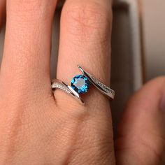 London blue topaz ring engagement ring wedding ring | Etsy Topaz Engagement Ring November, London Blue Topaz Engagement Rings, Blue Stones Jewelry, November Birthstone Ring, December Birthstone Ring, Blue Topaz Engagement Ring, Round Engagement Rings, London Blue Topaz Ring, Purple Stones