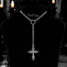 Forgive me father 🖤 This rosary inspired necklace features a curb style chain and a silver toned gothic style cross pendant with rhinestones.  Choose desired length when ordering. You can control whether you want to to fit tight or hang loose. Please take the time to measure your neck to ensure your satisfaction. Regardless of size chosen, there will be extra clasp rings attached to add a little more adjustable length.  Silver toned metals (silver plated chain) Lobster clasp closure  Handmade w Silver Cross Jewelry For Halloween, Silver Ankh Gothic Necklace, Gothic Cross Pendant Jewelry For Halloween, Gothic Jewelry With Cross Pendant And Adjustable Chain, Gothic Jewelry With Adjustable Chain And Cross Pendant, Silver Cross Necklace For Halloween, Silver Cross Pendant Jewelry For Halloween, Adjustable Gothic Cross Pendant Jewelry, Halloween Silver Jewelry With Cross Pendant