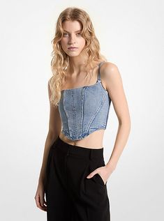 Unmistakably feminine yet utterly cool, this denim corset top is a decidedly fun take on the romantic classic. With seamed details and a zip-back closure, it makes a statement worn alone or layered over a T-shirt. Expect compliments. Denim Crop Top Outfit, Top Over Shirt, Jean Top Outfits, Denim Bustier Top, Denim Bustier, Romantic Classic, Denim Corset Top, Top Bustier, Denim Crop Top