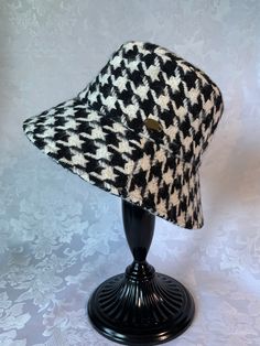 Highly recommended by seller.  Beautiful and stylish houndstooth pattern bucket hat to keep your head warm in cold season. Adult size, one size fit all ; suitable for head circumference 56-58cm Approximately 3 1/3 inches high, 3 inches brim Plaid Short Brim Hat For Winter, Winter Plaid Hat With Short Brim, Plaid Short Brim Winter Hat, Adjustable Brimmed Hat With Herringbone Pattern, Plaid Short Brim Hat For Fall, Plaid Short Brim Fall Hats, Tweed Bucket Hat, Plaid Bucket Hat, Bucket Hat Winter