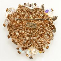 This is part of Chairish’s Costume Jewelry assortment.  Cluster brooch made with a collage of components including crystal beads with iridescent finish, clear rhinestones and gold plated leaves. Filigree backing is also gold plated. Marked Vendome. Measures 2" long and about 1 3/4" wide. Overall condition is excellent for this type of vintage piece dating to the 1960s. There is some discoloration to some of the tiny metal components but the larger gold plated leaf findings and filigree on the ba Iridescent Crystal, A Collage, Clear Rhinestones, Crystal Beads, Costume Jewelry, Antique Jewelry, Vintage Antiques, 1960s